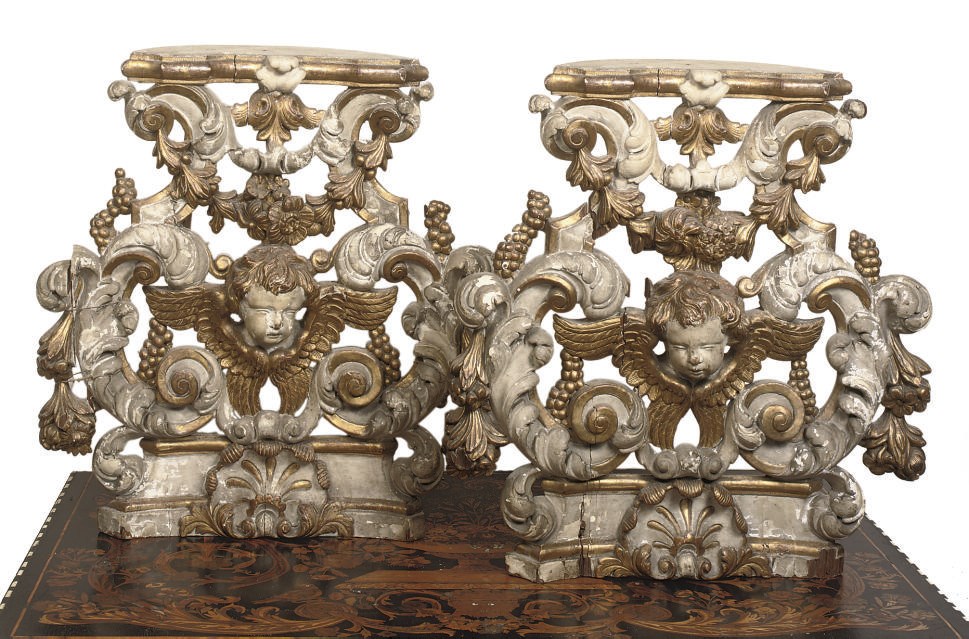 A PAIR OF WHITE PAINTED AND PARCEL-GILT CARVED ALTAR ORNAMENTS