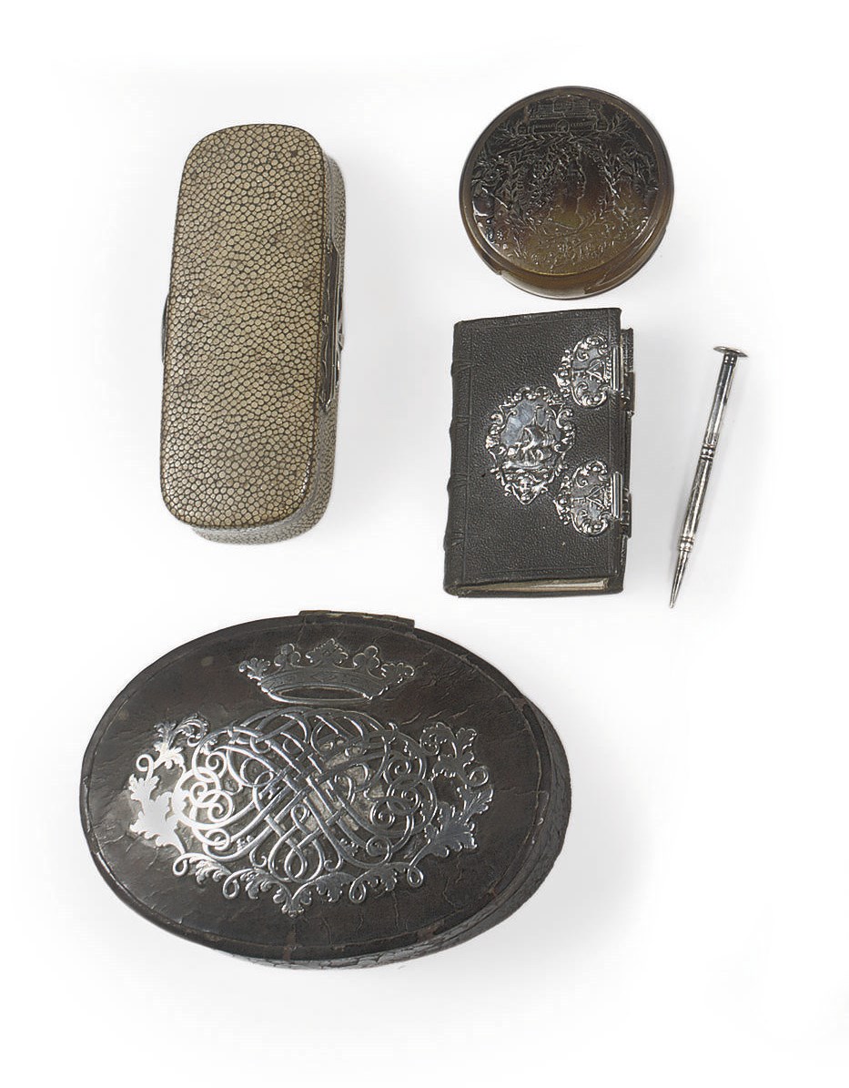 A DUTCH SILVER MOUNTED LEATHER COVERED OVAL BRASS BOX