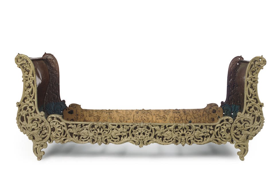 A NORTH EUROPEAN WHITE PAINTED CAST-IRON SINGLE BED