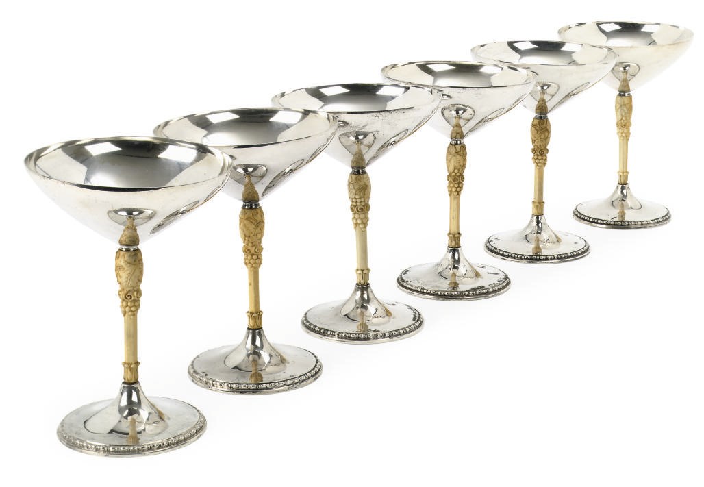 A SET OF SIX SILVER, SILVER PLATED AND IVORY CHAMPAGNE CUPS