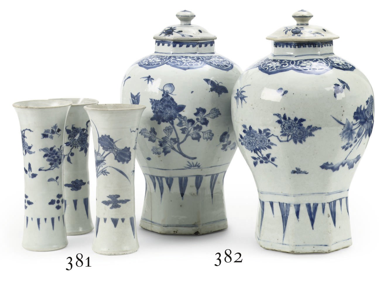 A pair of Chinese Transitional 'Hatcher Cargo' blue and white jars and matched covers