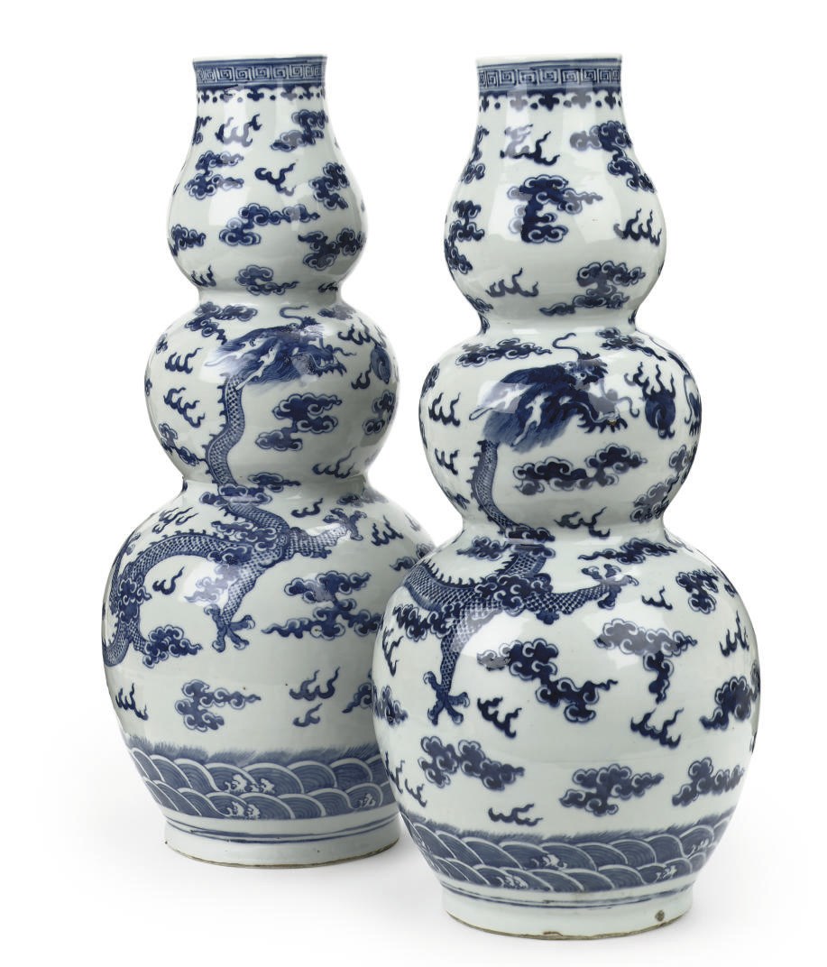A pair of Chinese blue and white triple-gourd 'dragon' vases