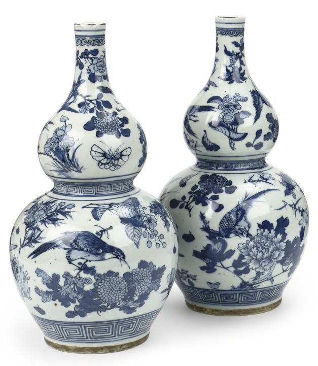A pair of Chinese blue and white double-gourd vases