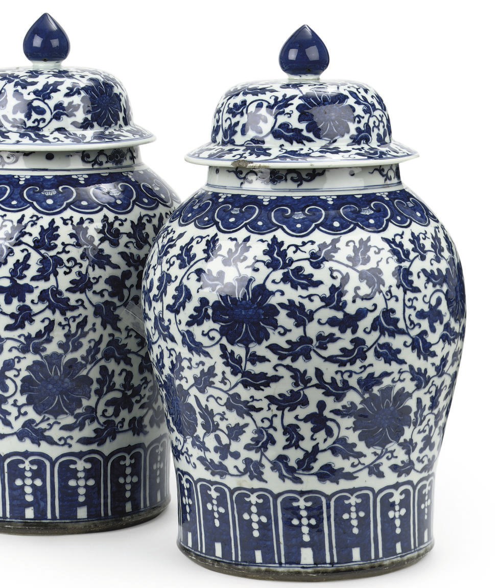 A large pair of Chinese blue and white baluster jars and covers