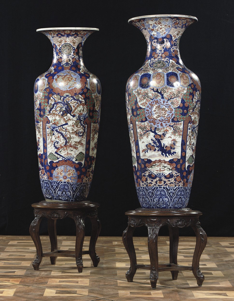A pair of large Japanese Imari baluster vases