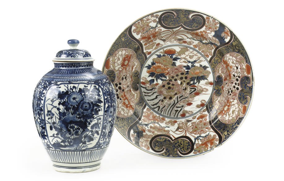 A Japanese Arita blue and white ovoid jar and cover and a Japanese Imari charger