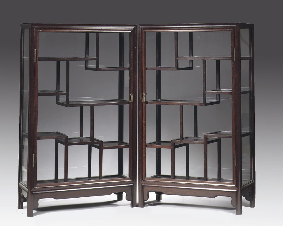 A pair of Chinese hardwood display cabinets