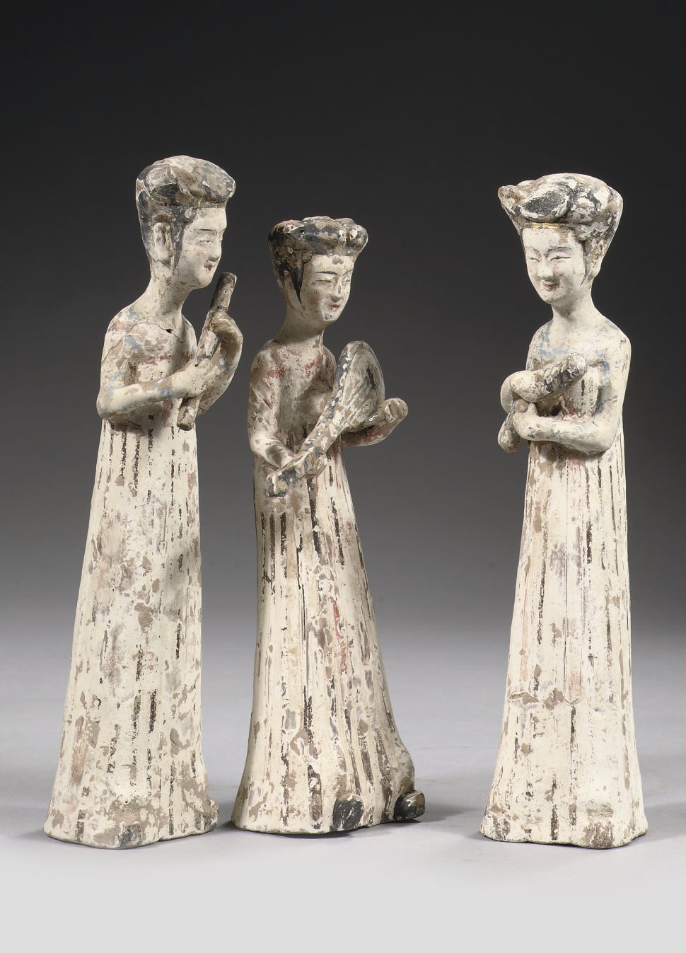 Three Chinese pottery figures of lady musicians
