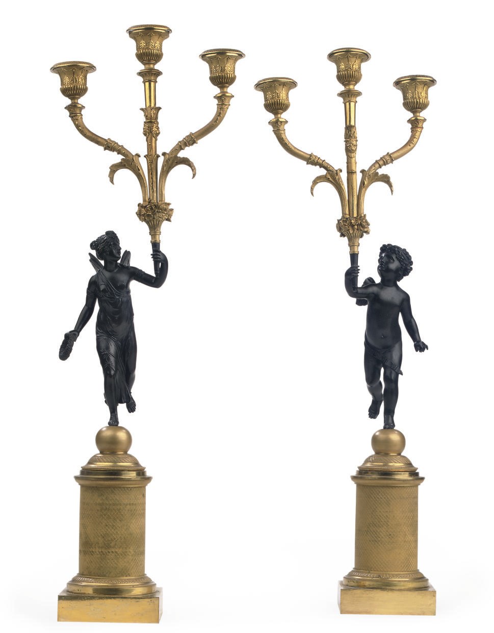 A PAIR OF RESTAURATION ORMOLU AND PATINATED BRONZE FIGURAL CANDELABRA