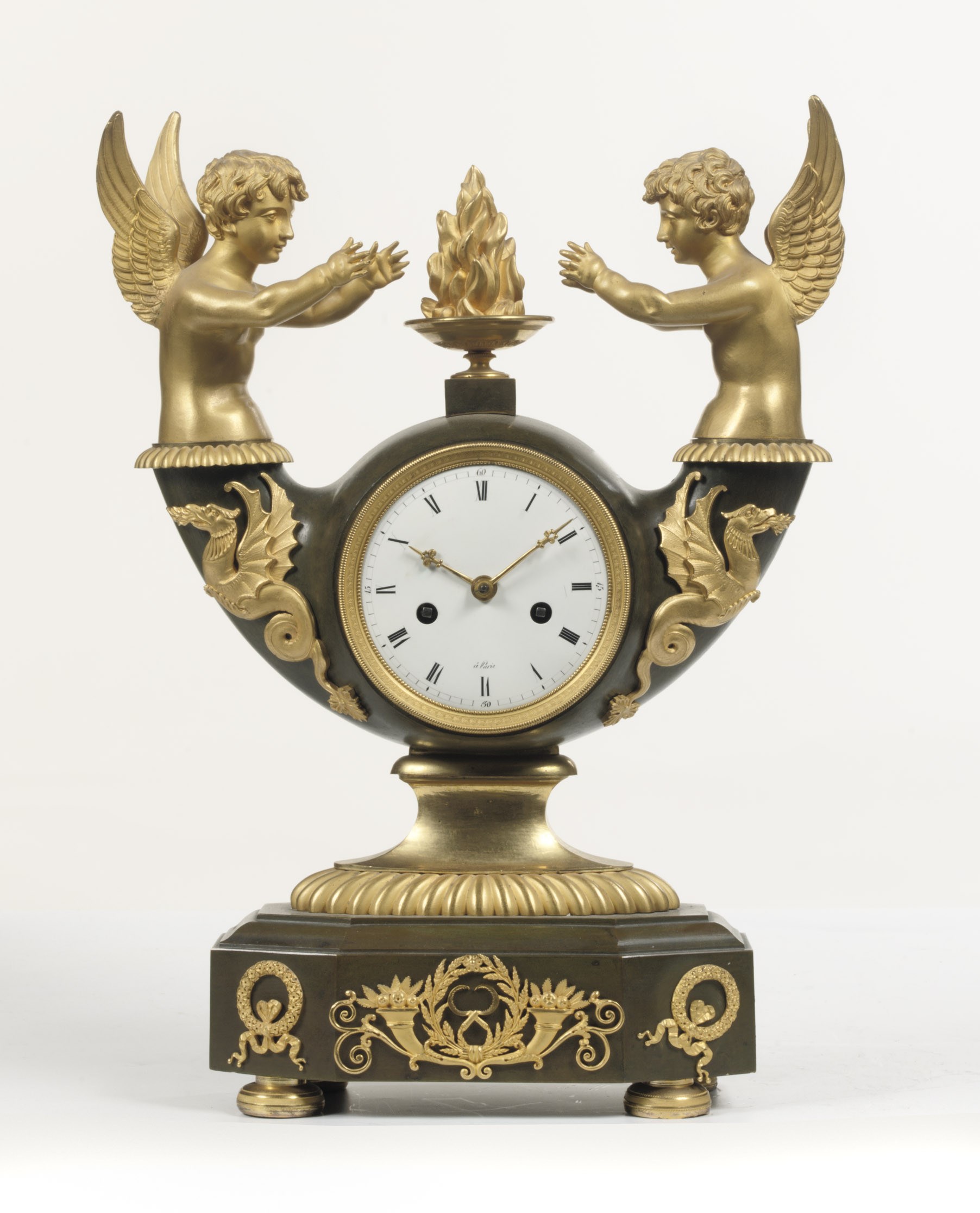 A RESTAURATION ORMOLU-MOUNTED PATINATED BRONZE STRIKING FIGURAL MANTEL CLOCK