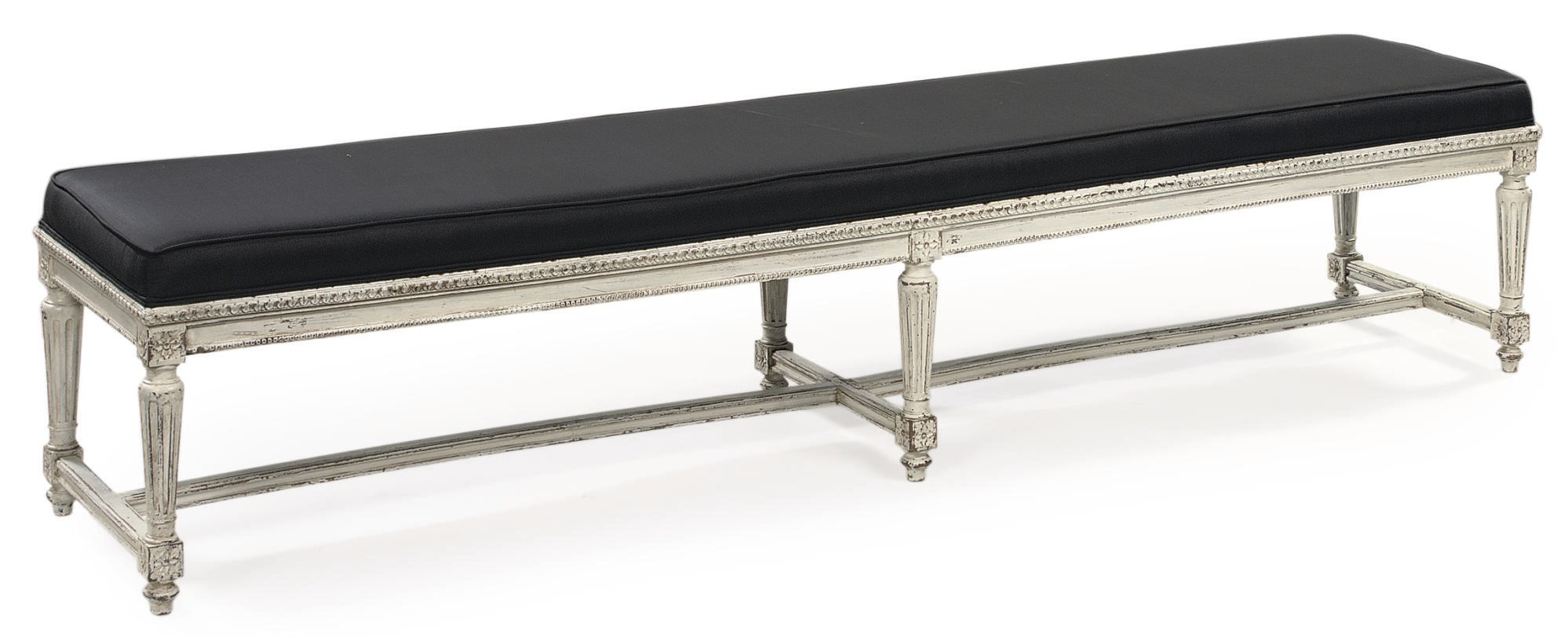 A WHITE-PAINTED BANQUETTE