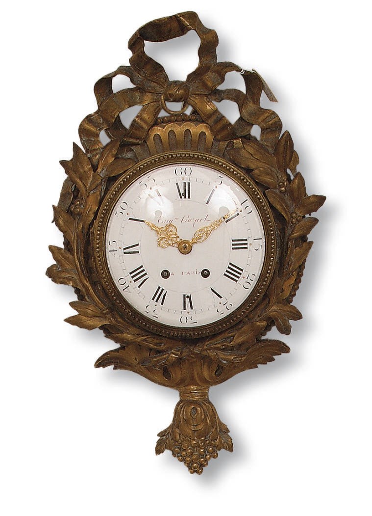 A FRENCH ORMOLU STRIKING CARTEL CLOCK