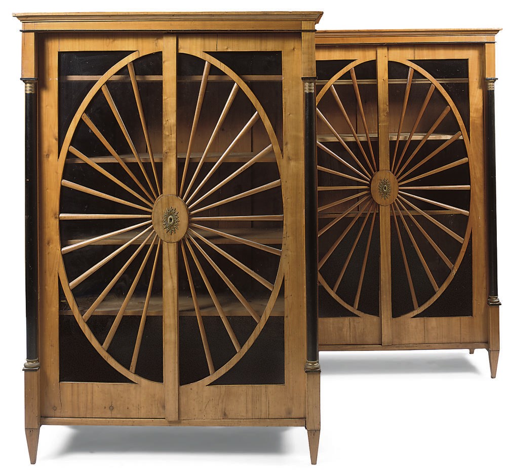 A PAIR OF AUSTRIAN BIEDERMEIER ORMOLU-MOUNTED CHERRYWOOD AND EBONISED BOOKCASES