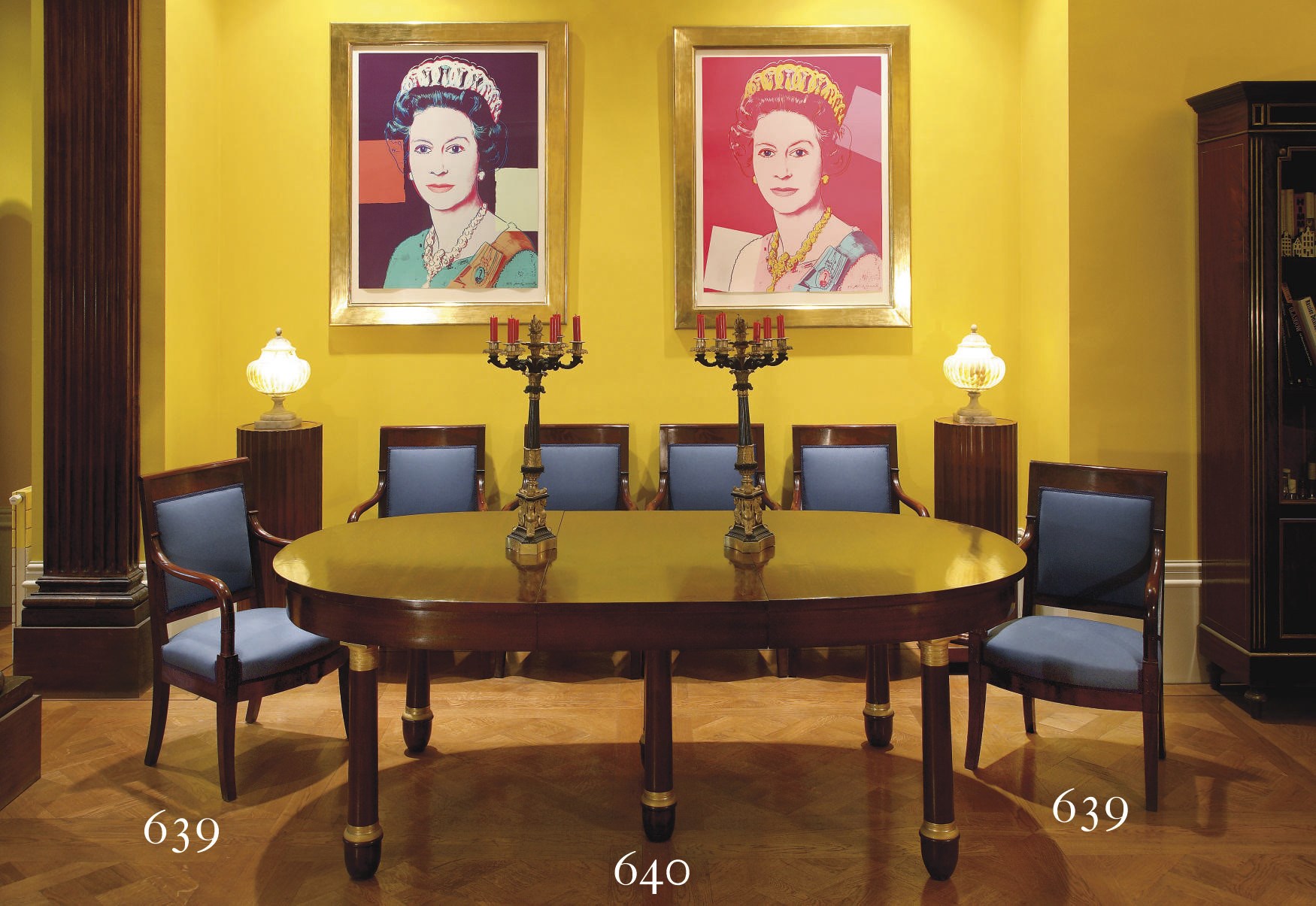 A FRENCH ORMOLU-MOUNTED MAHOGANY EXTENDING DINING TABLE