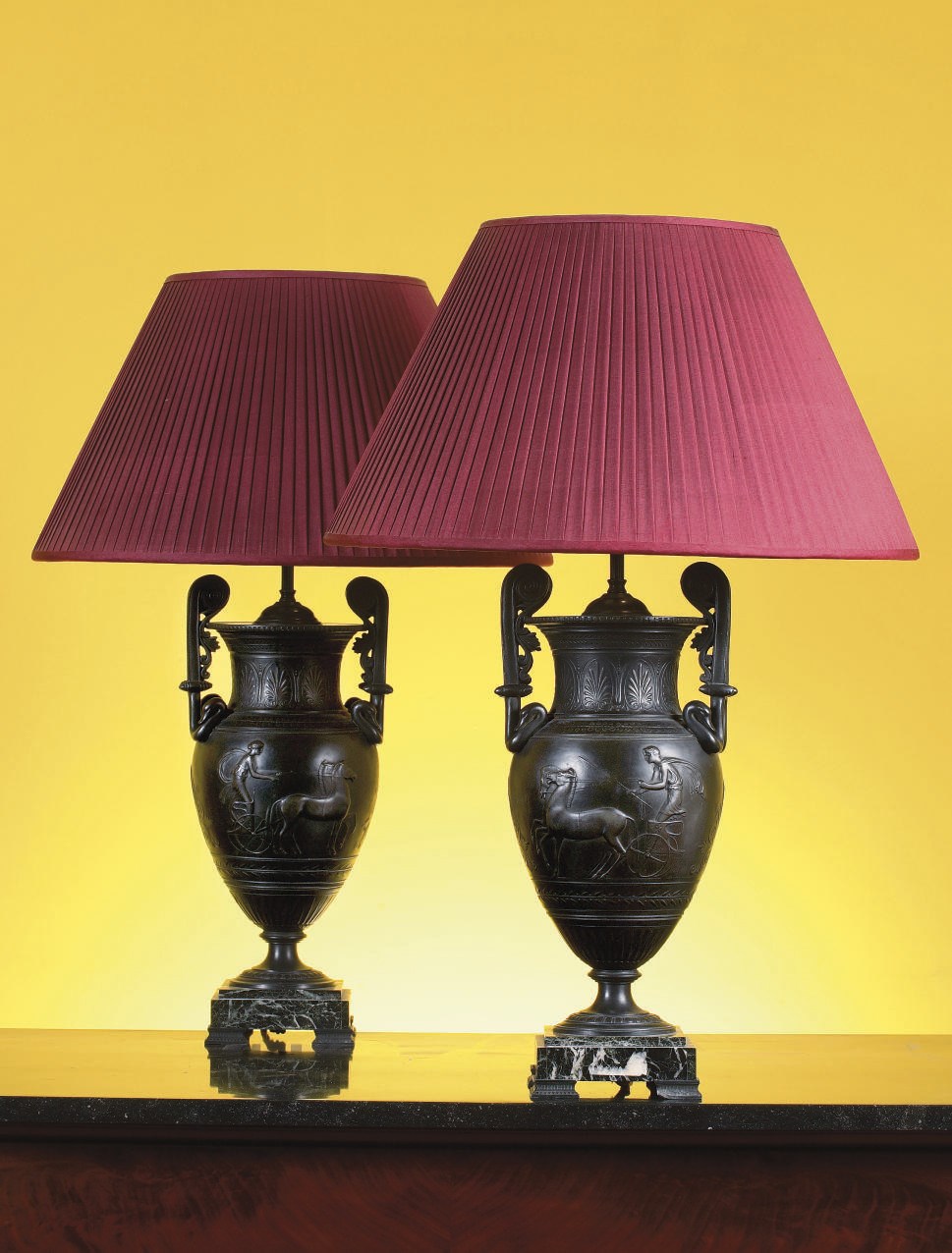 A PAIR OF FRENCH PATINATED METAL GRECIAN VASES MOUNTED AS TABLE LAMPS