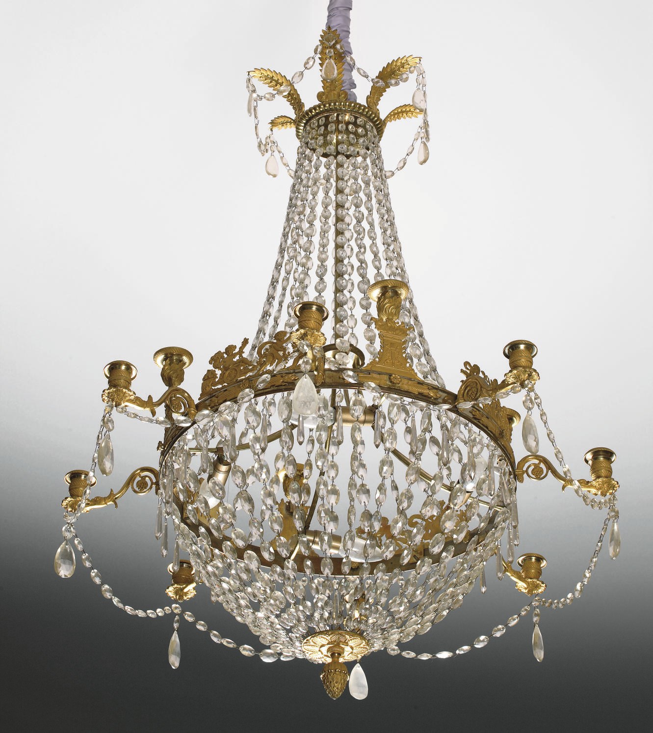 A FRENCH ORMOLU AND CUT-GLASS TWELVE-LIGHT CHANDELIER