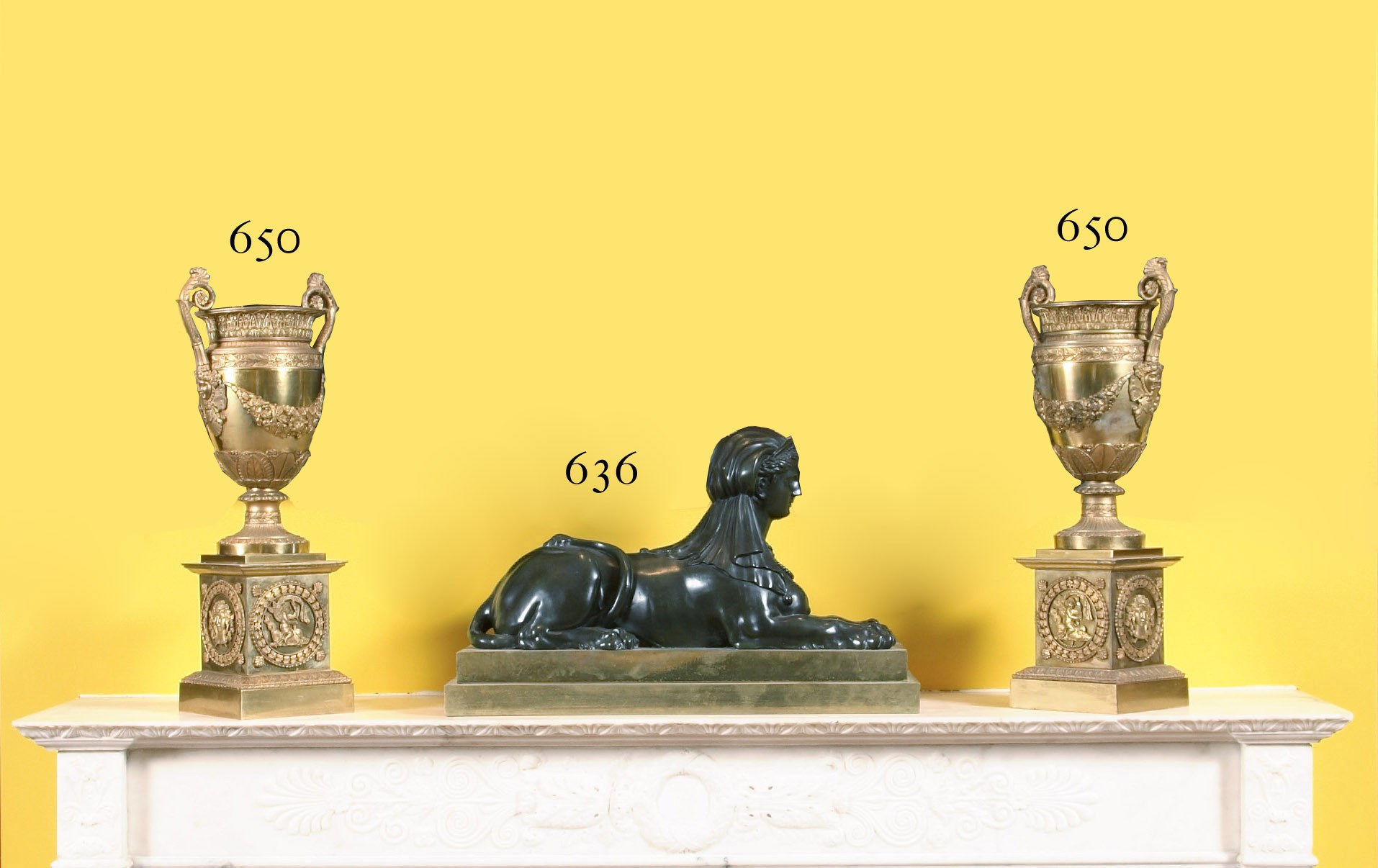 A PAIR OF FRENCH ORMOLU TWO-HANDLED VASES
