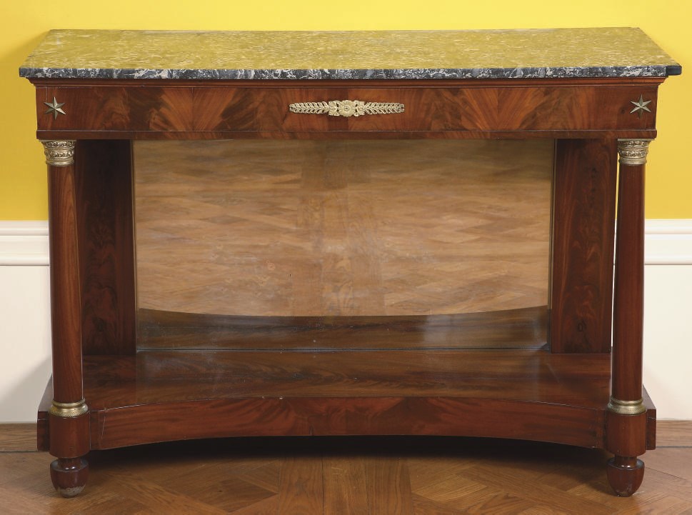 A RESTAURATION ORMOLU-MOUNTED MAHOGANY CONSOLE TABLE
