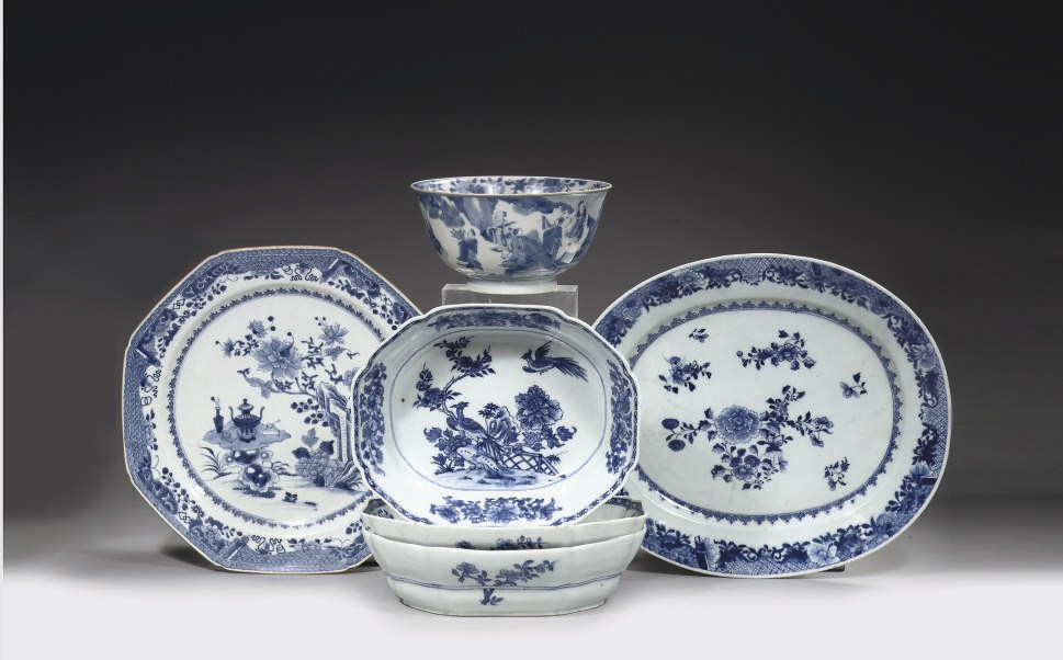 A Chinese blue and white bowl and set of three blue and white serving dishes