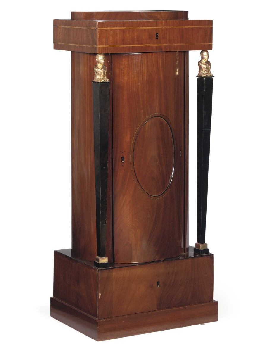 A MAHOGANY, FRUITWOOD, EBONISED AND PARCEL-GILT PEDESTAL CUPBOARD