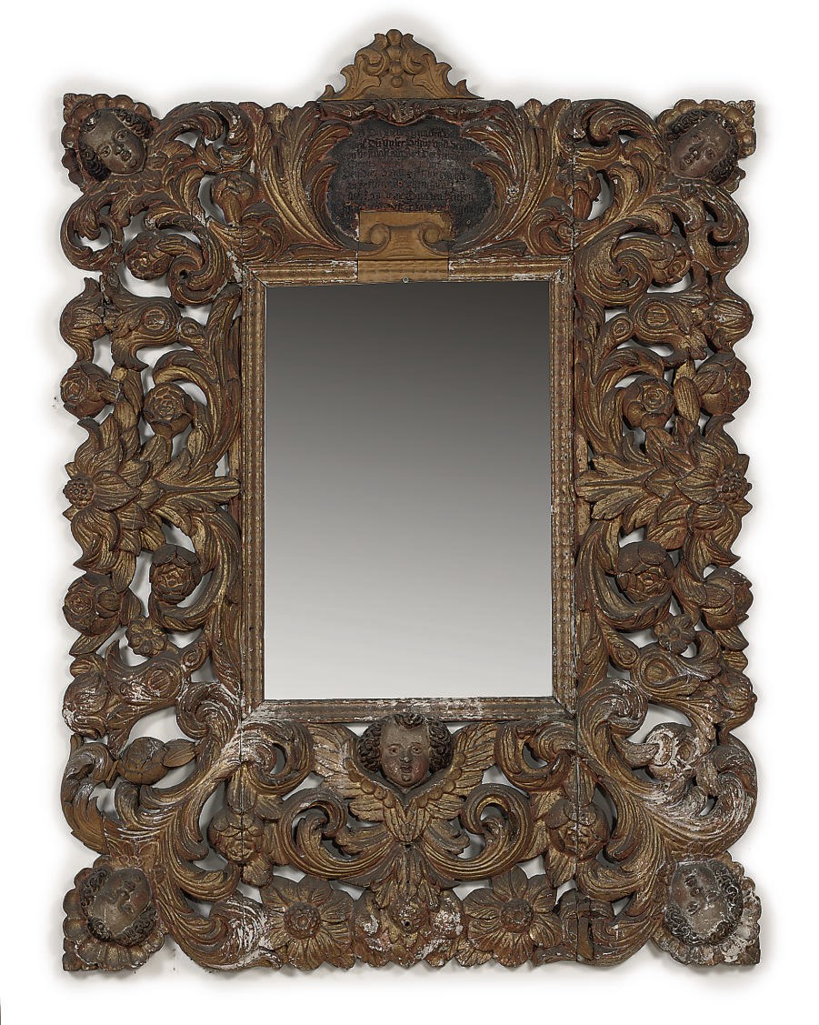AN AUSTRIAN POLYCHROME AND PARCEL-GILT GILT CARVED WOOD FRAME