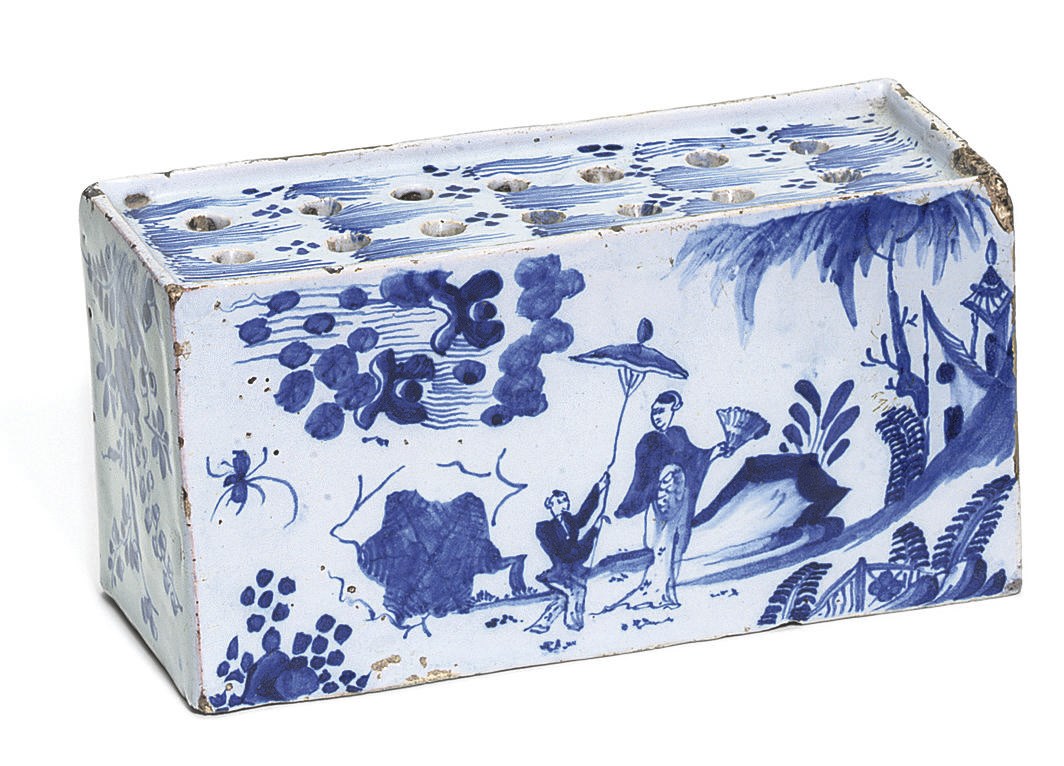 A BRISTOL DELFT BLUE AND WHITE RECTANGULAR FLOWER-BRICK