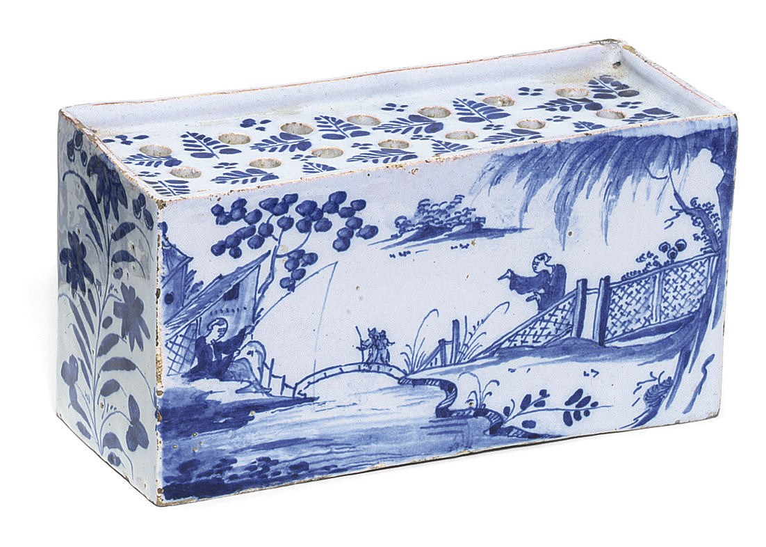 A BRISTOL DELFT BLUE AND WHITE RECTANGULAR FLOWER-BRICK