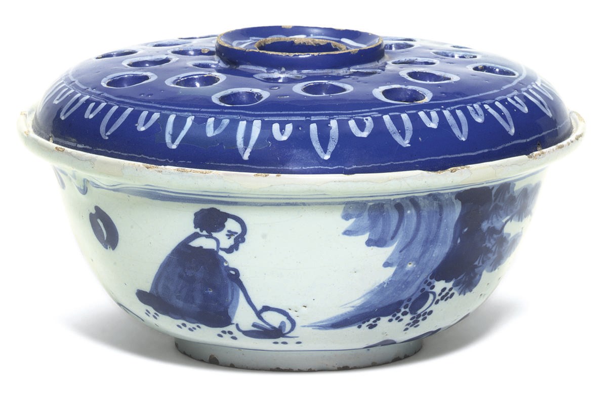 A LONDON DELFT BLUE AND WHITE CIRCULAR PIERCED FLOWER-BOWL