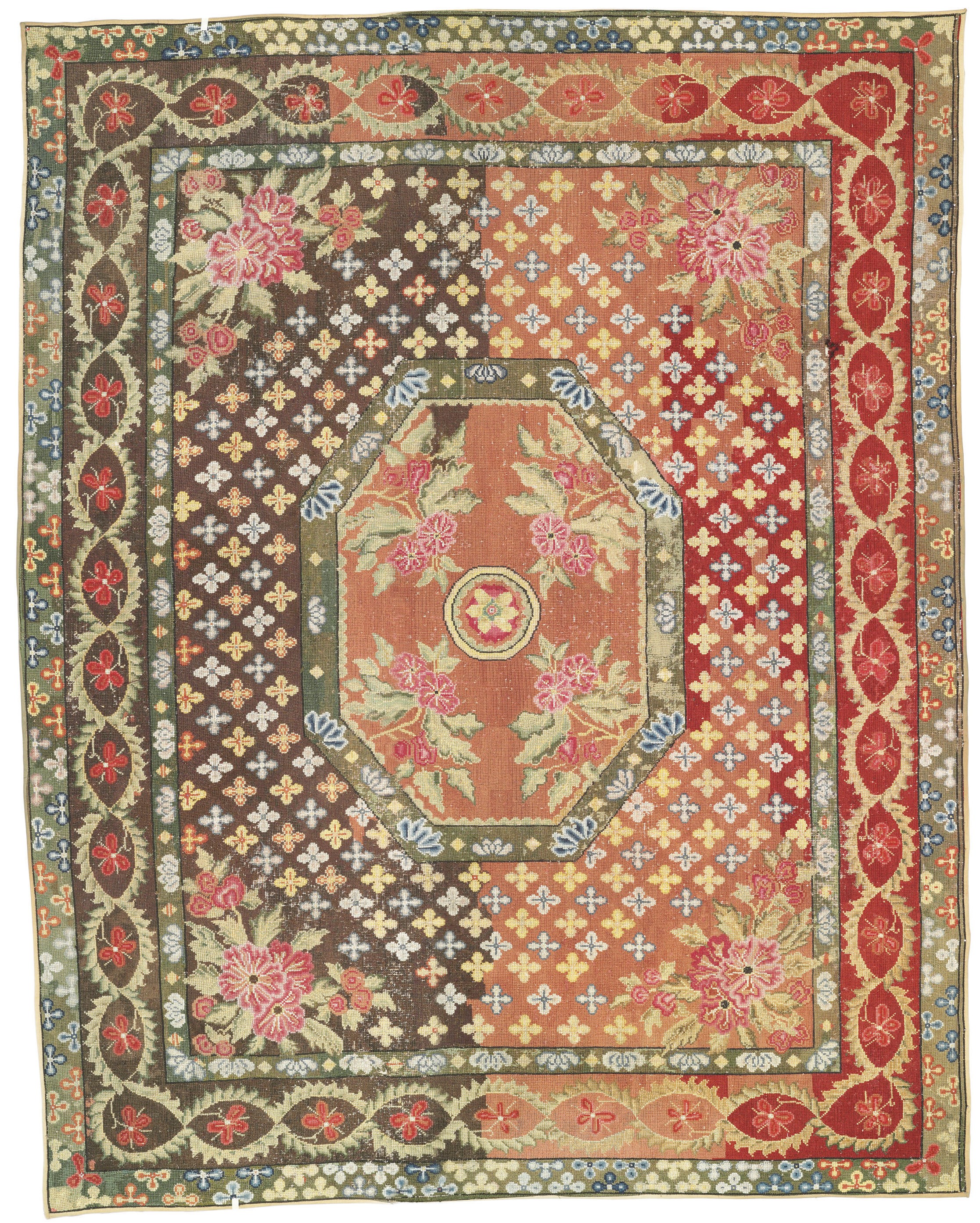 A GEORGE III GROS-POINT NEEDLEWORK CARPET
