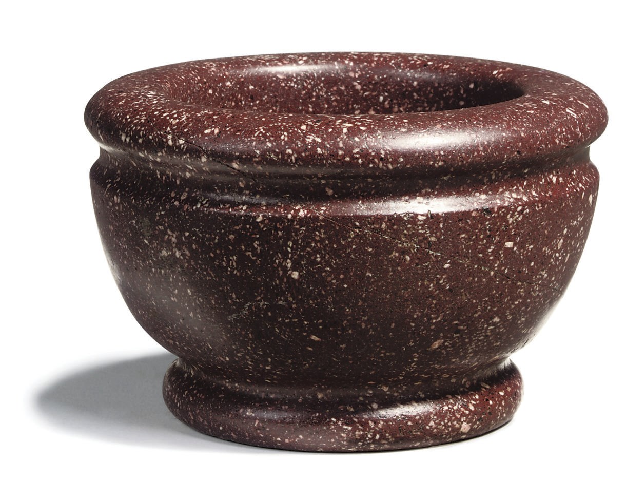 AN ITALIAN CIRCULAR PORPHYRY MORTAR