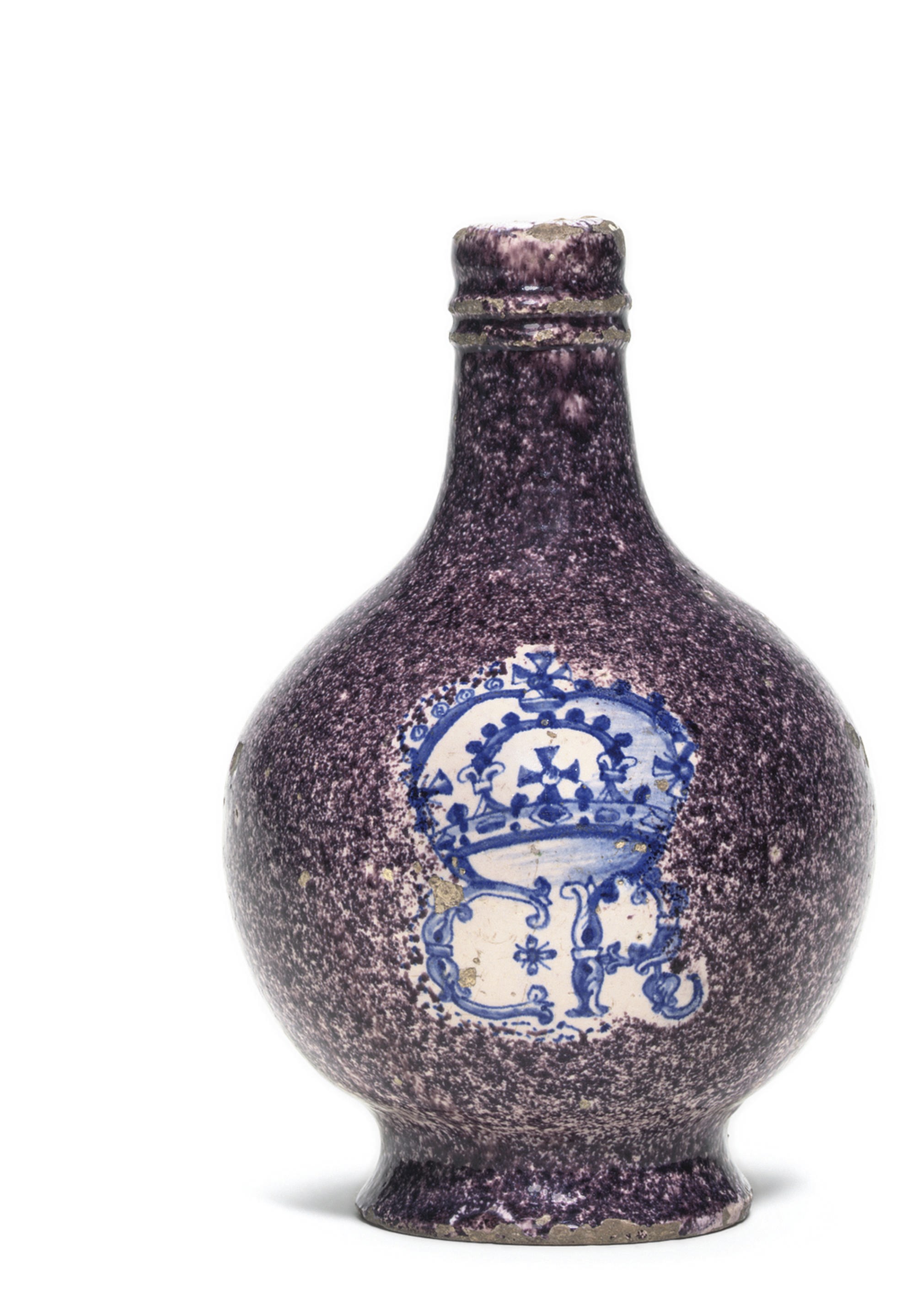 A LONDON DELFT POWDERED-MANGANESE GROUND ROYALIST WINE-BOTTLE