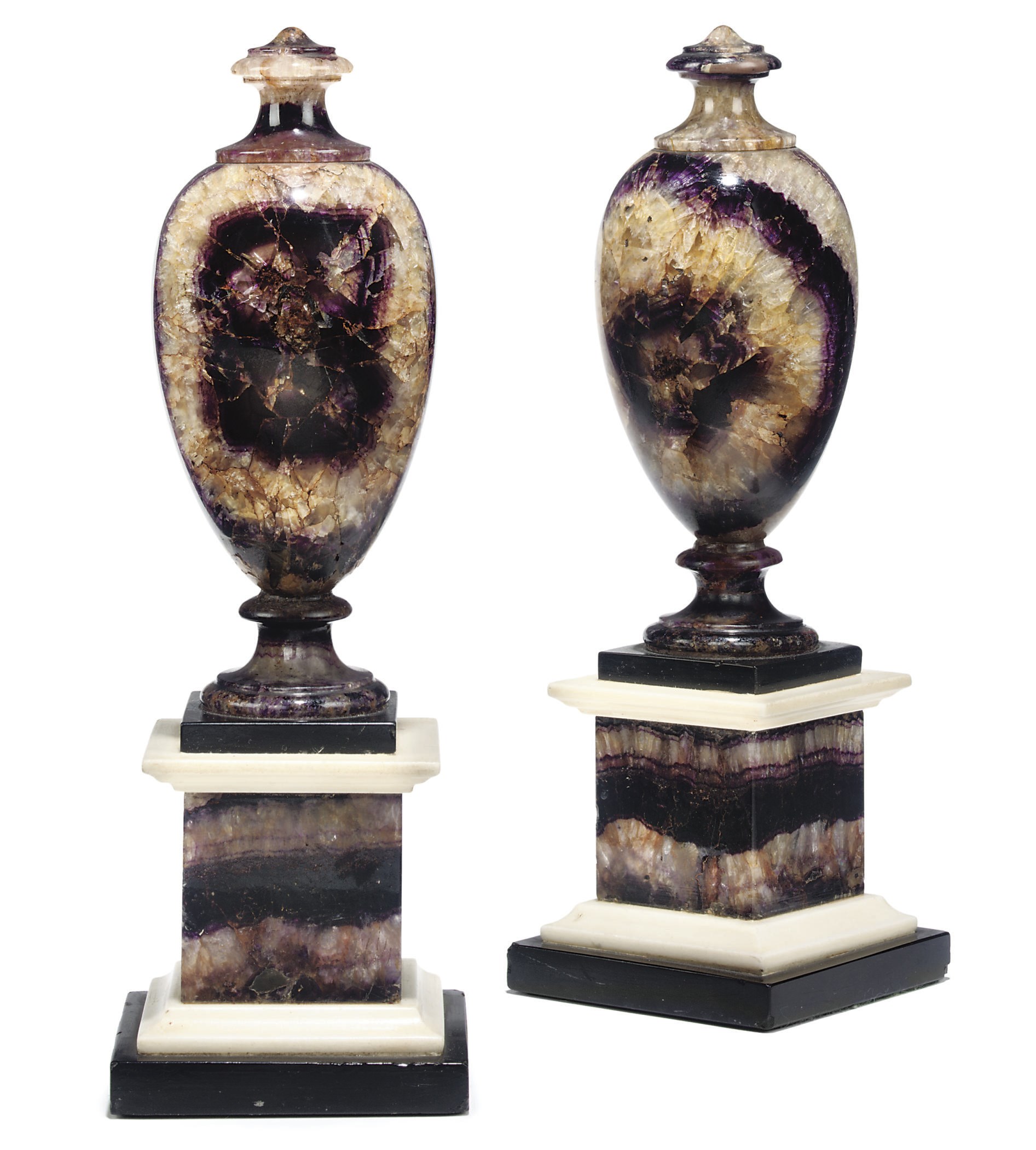 A PAIR OF GEORGE III BLUE-JOHN AND WHITE MARBLE SOLID URNS