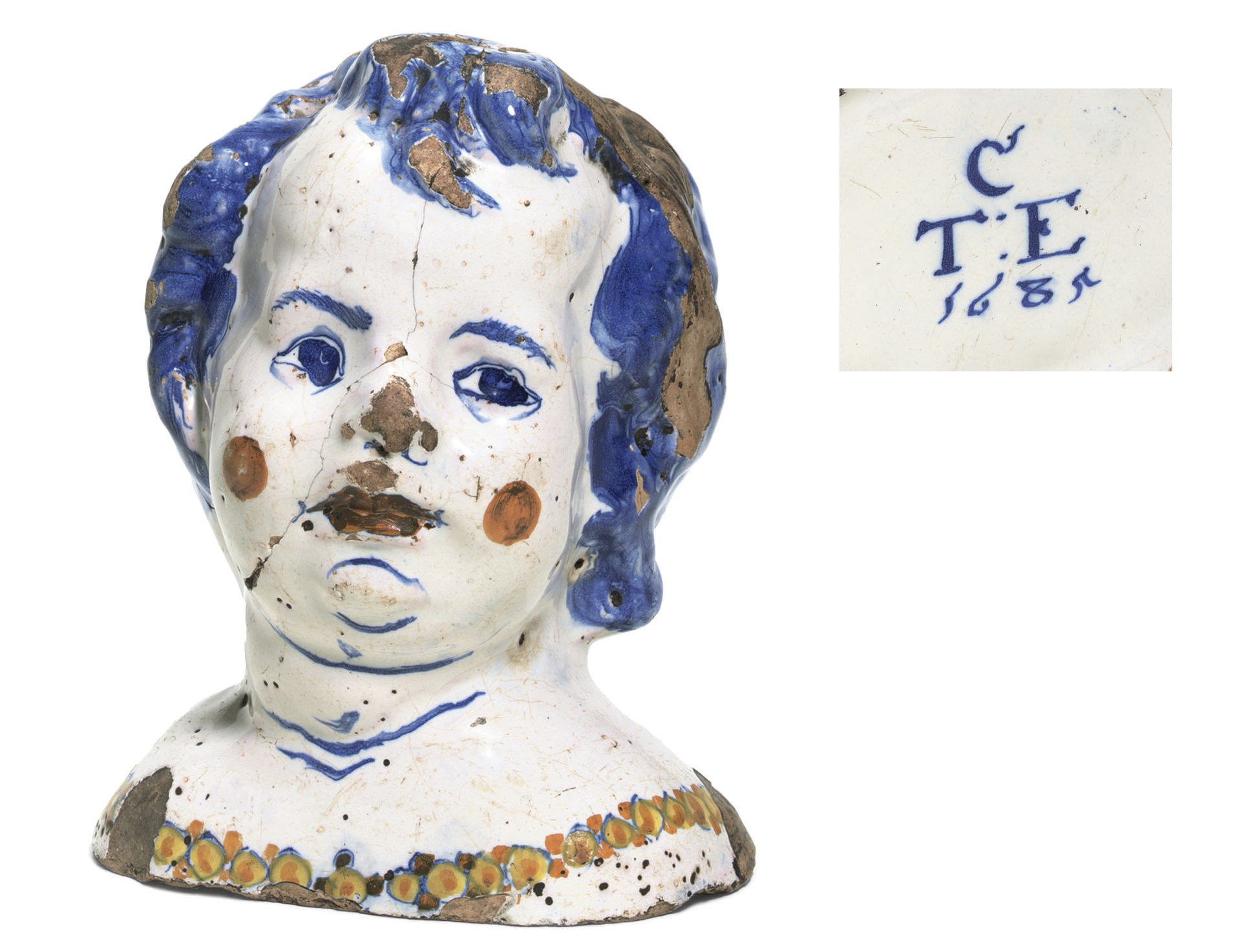 A LONDON DELFT DATED POLYCHROME FLOWER VASE IN THE FORM OF A CHILD'S HEAD