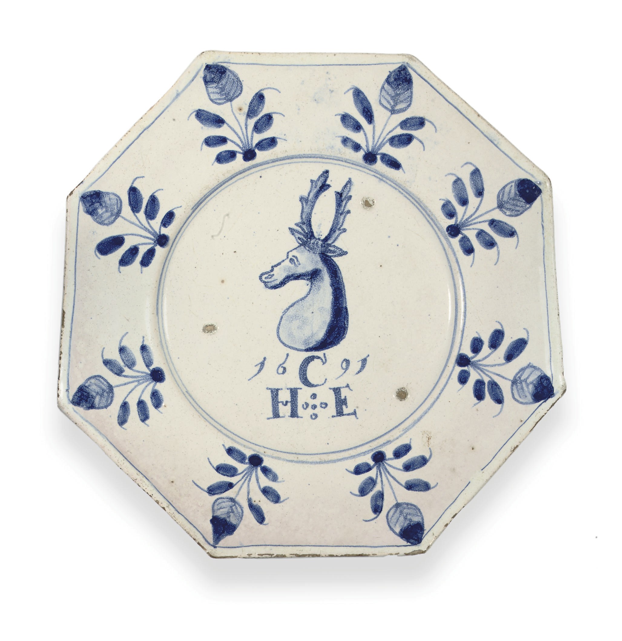 A BRISLINGTON BLUE AND WHITE CRESTED DATED OCTAGONAL PLATE