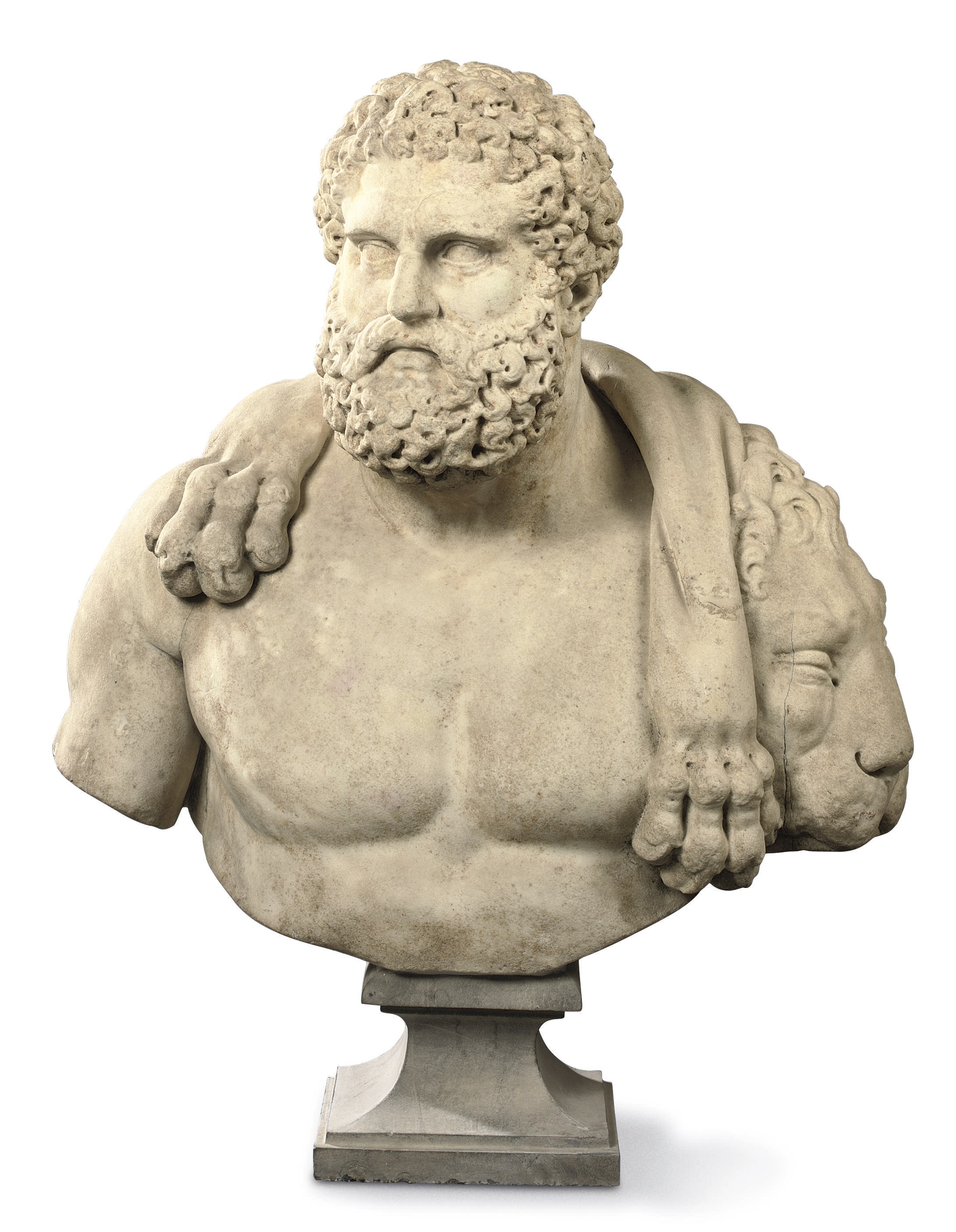 A CARVED MARBLE BUST OF HERCULES