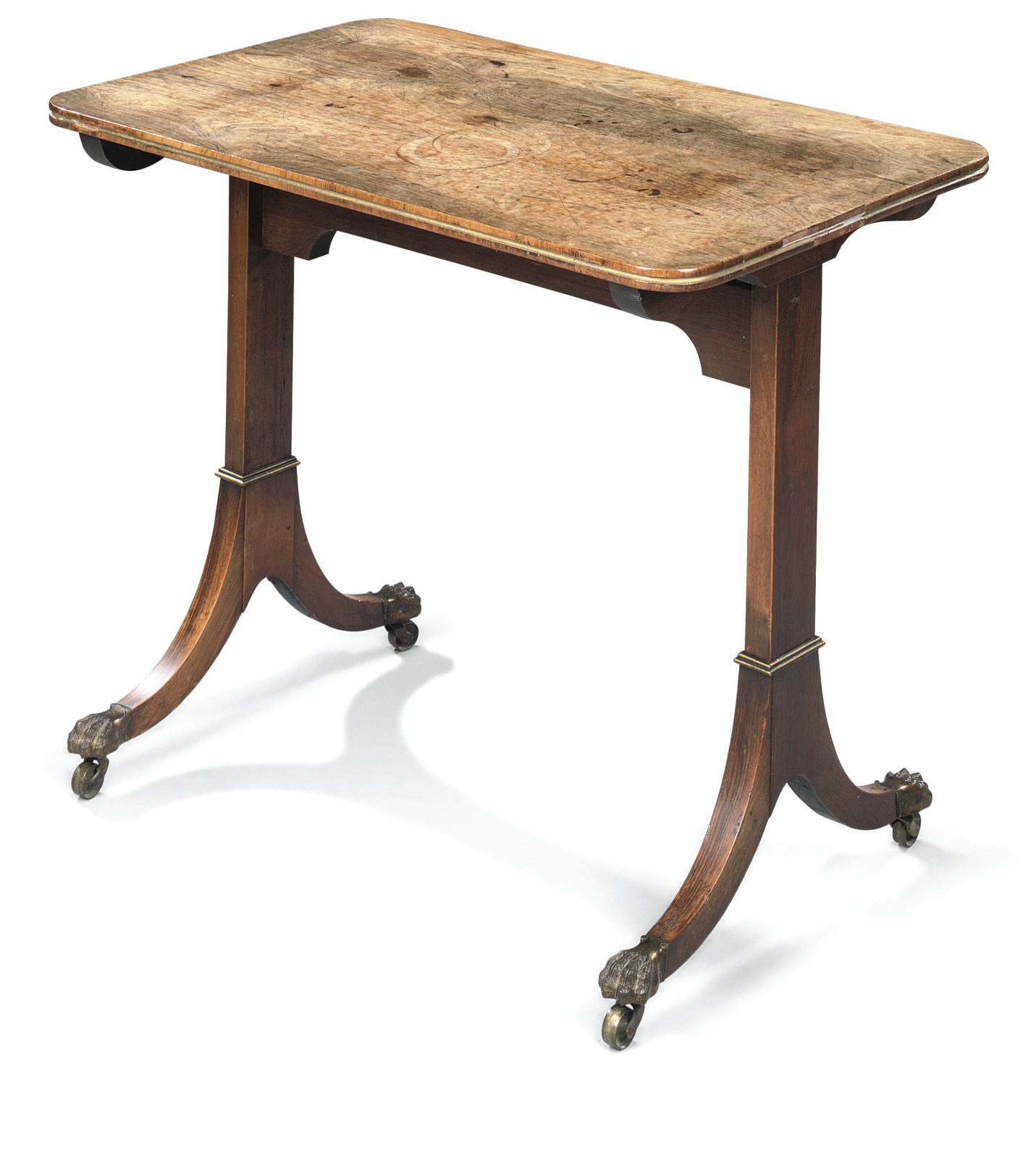 A REGENCY ROSEWOOD AND PARCEL-GILT CHAMBER TABLE