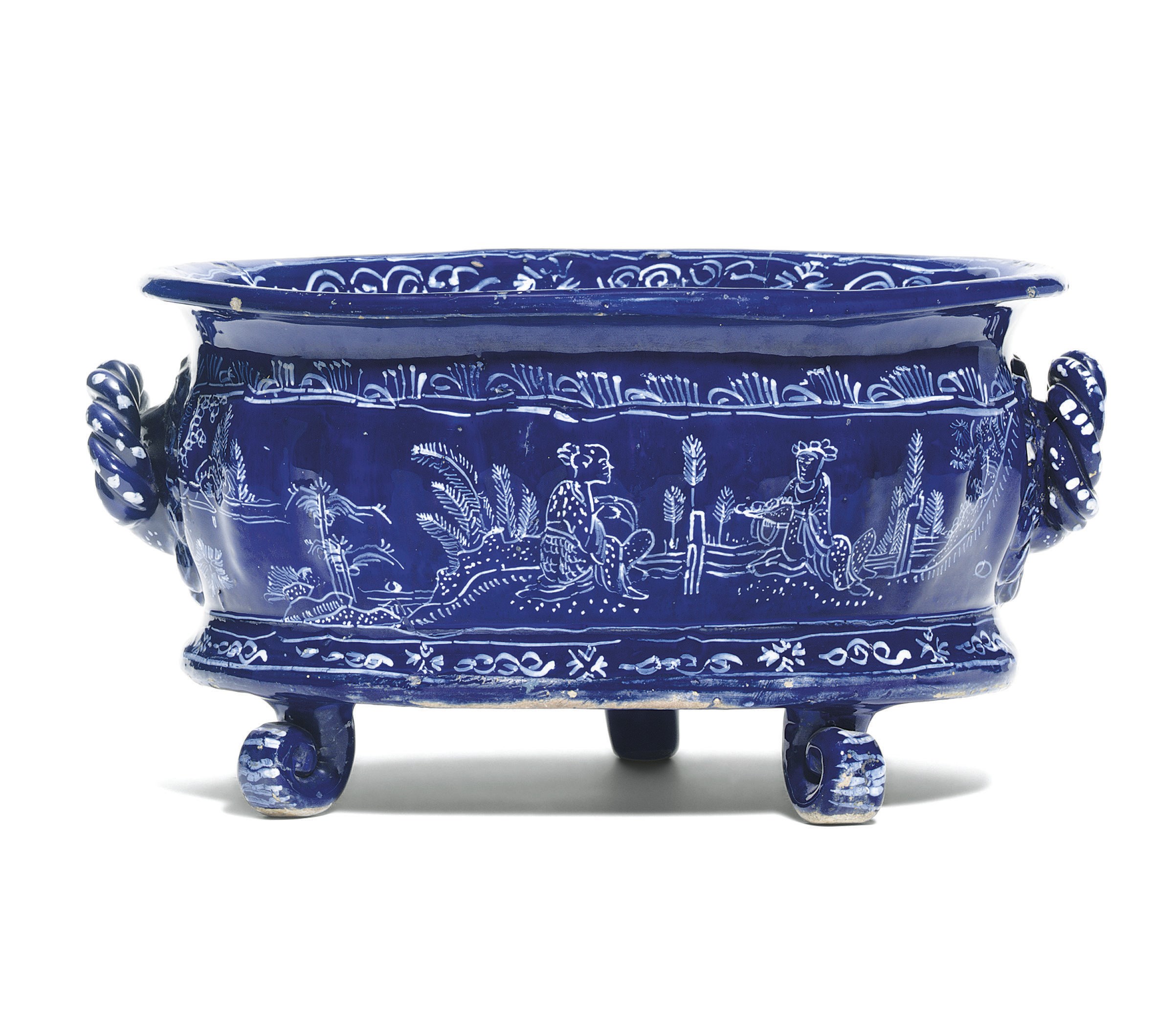 A LONDON DELFT BLEU PERSAN GADROONED OVAL TWO-HANDLED CISTERN