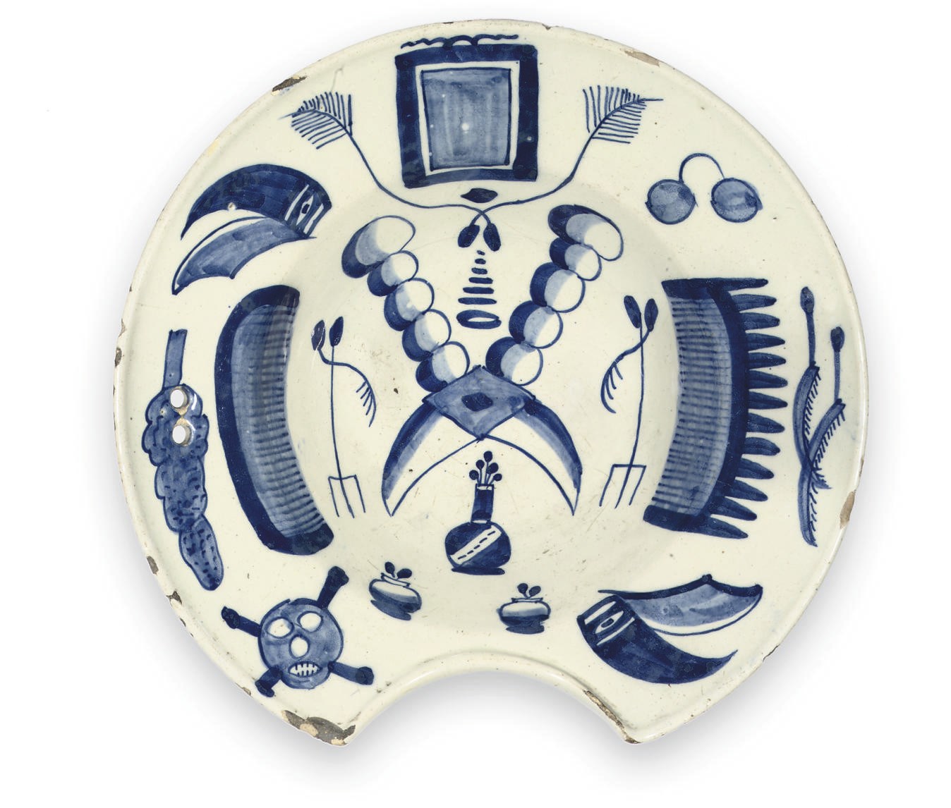 A TIN-GLAZED BLUE AND WHITE BARBER'S BOWL