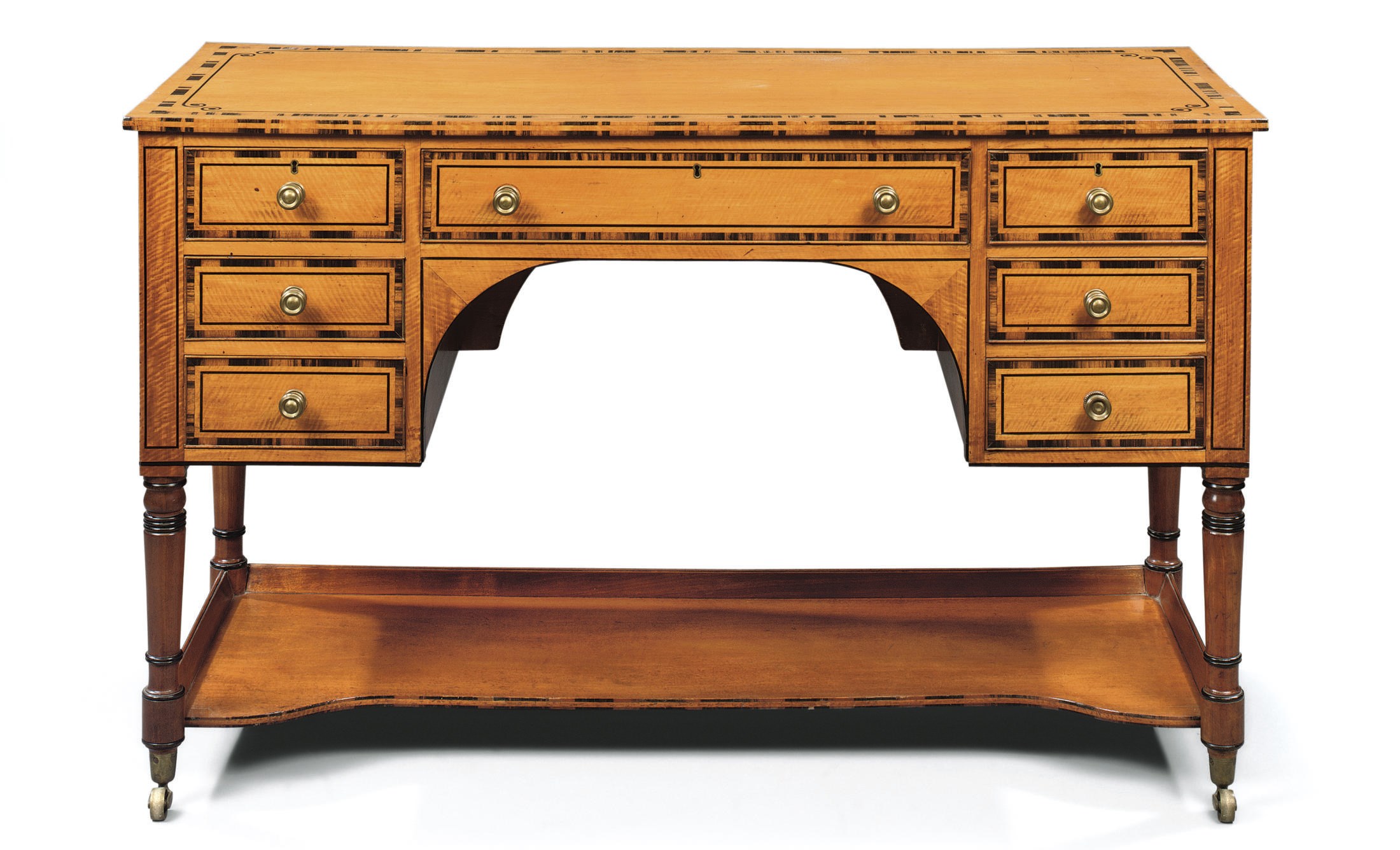 A REGENCY SATINWOOD AND CALAMANDER DRESSING-TABLE