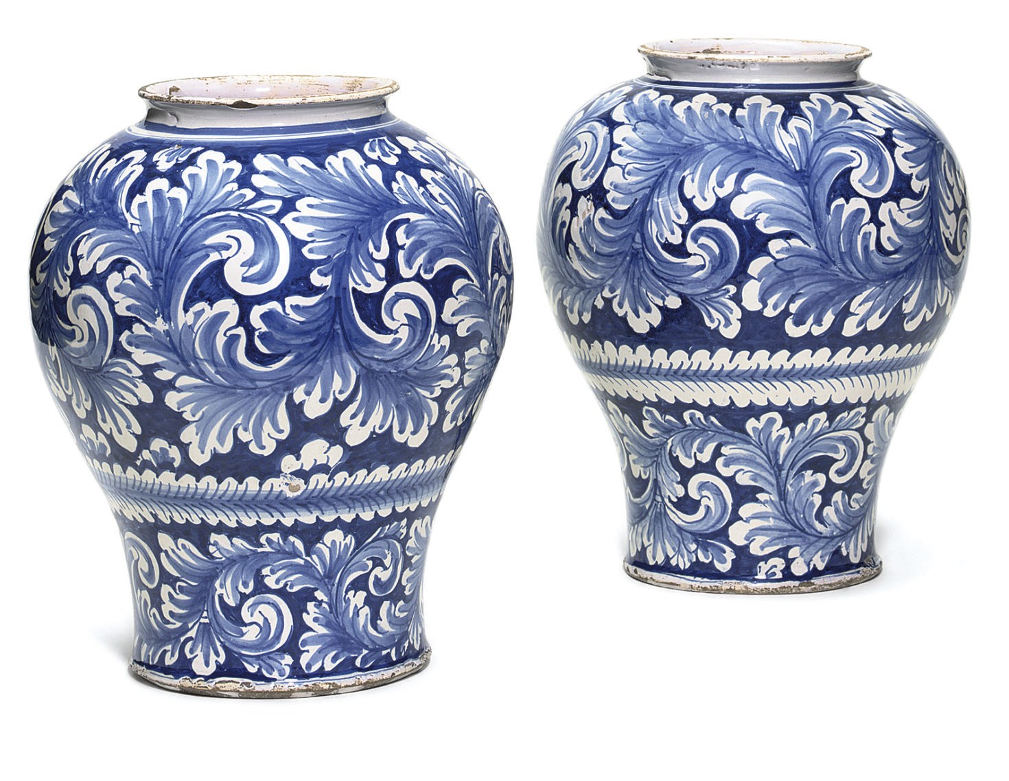 A PAIR OF ENGLISH DELFT BLUE AND WHITE BALUSTER VASES