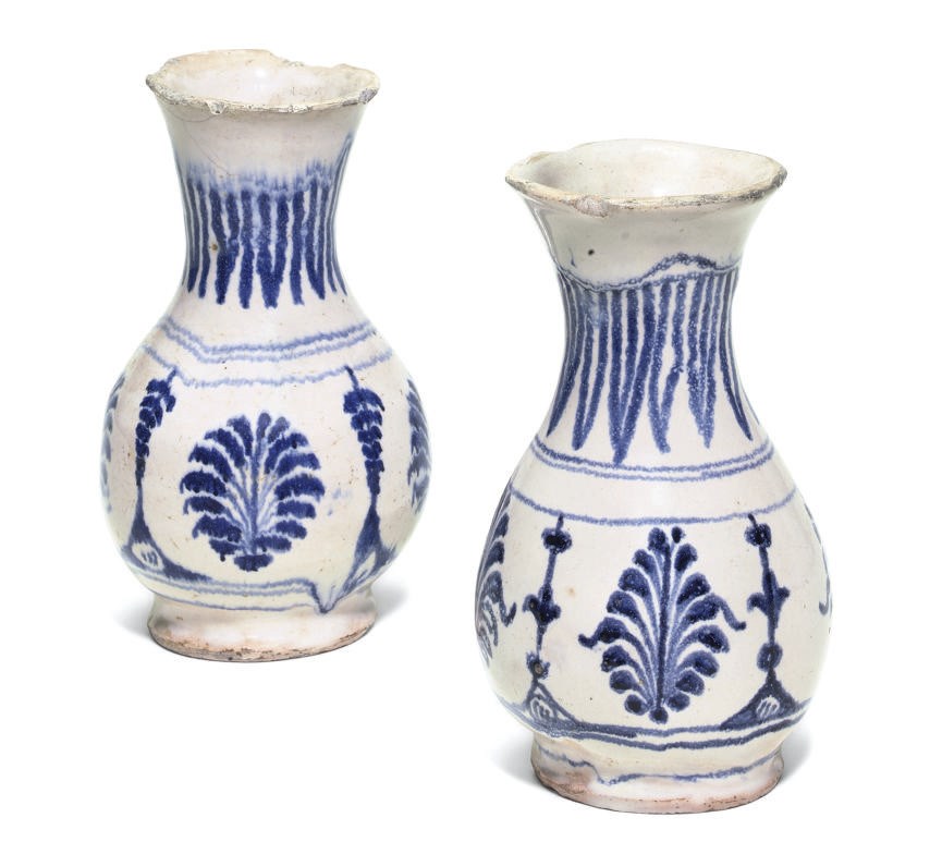 A PAIR OF BLUE AND WHITE TIN-GLAZED EARTHENWARE BALUSTER VASES