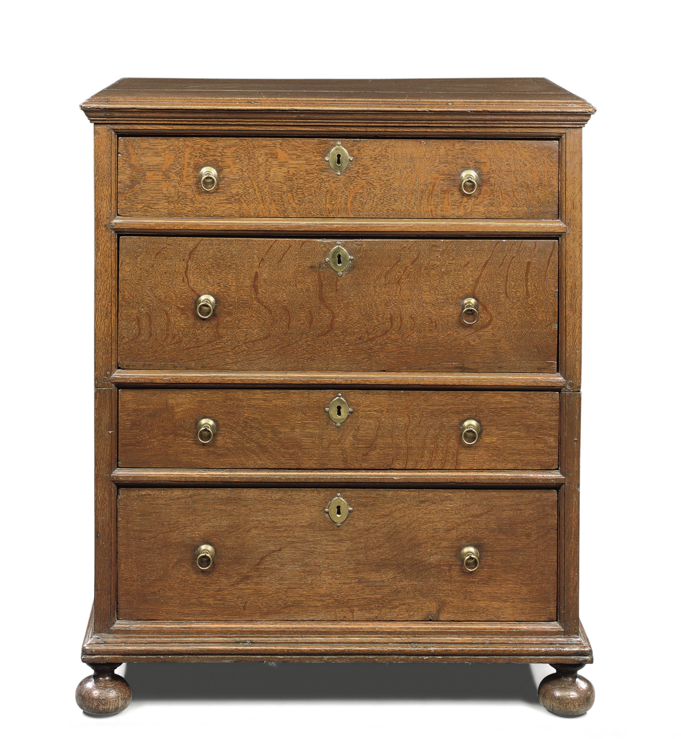 A GEORGE II OAK CHEST
