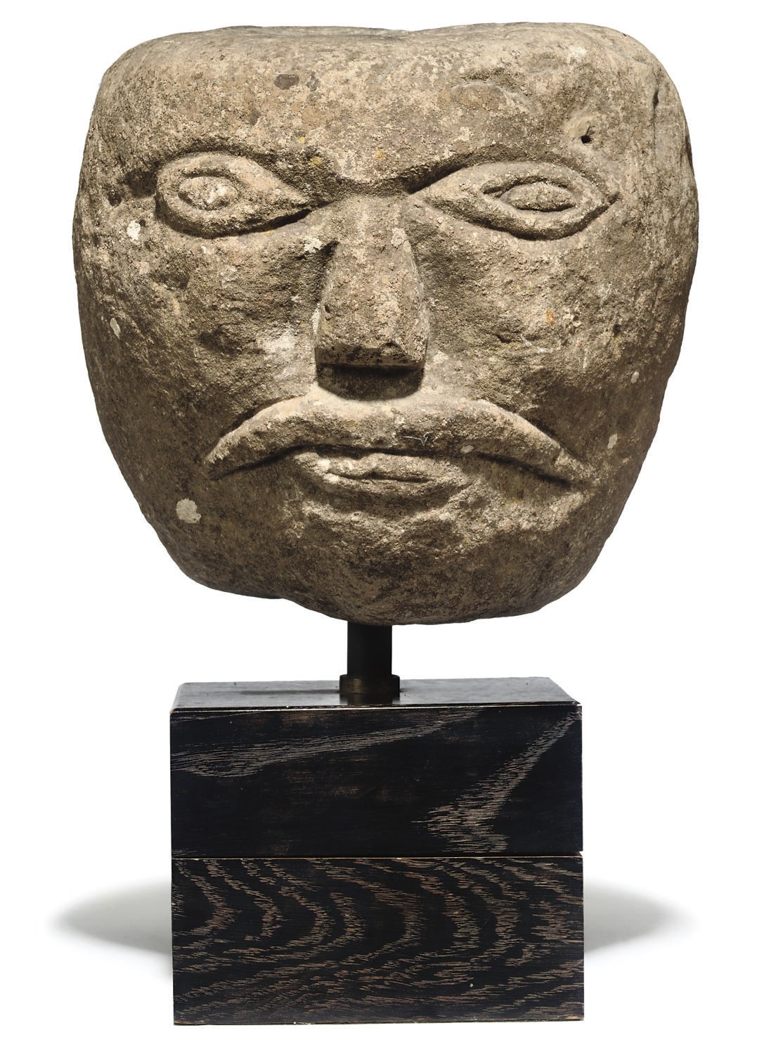 A CARVED STONE FRAGMENTED HEAD