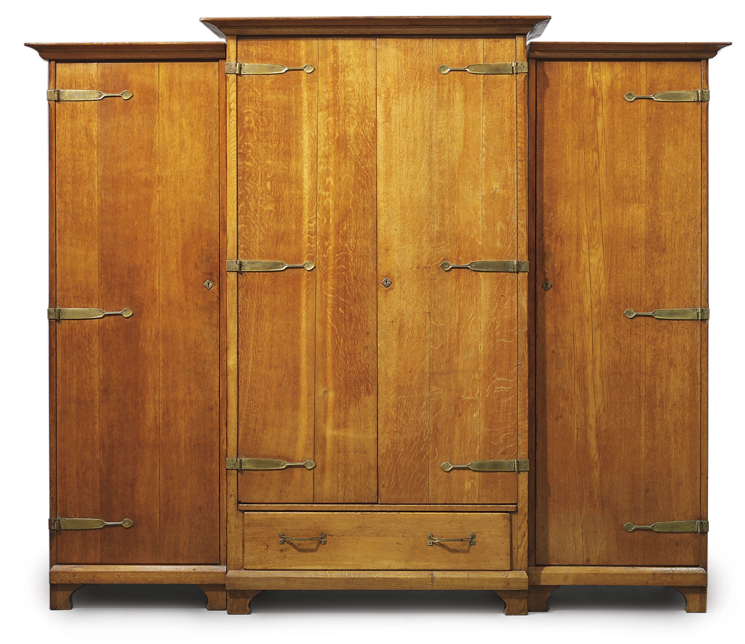 A GERMAN OAK THREE-PART WARDROBE