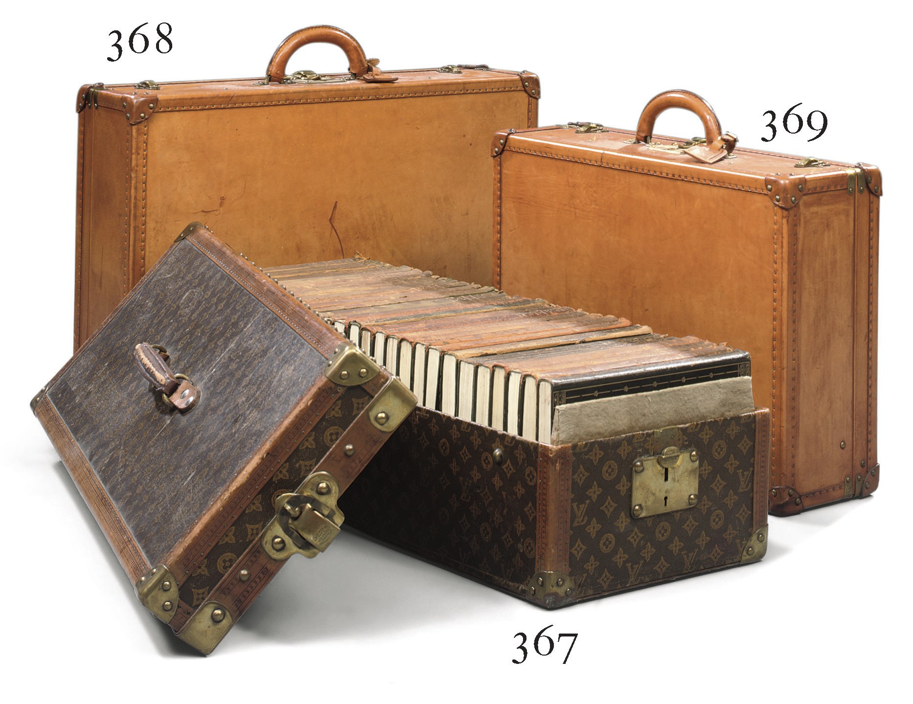 A LOUIS VUITTON MONOGRAM TRUNK CONTAINING A COMPLETE SET OF ENCYCLOPAEDIA
