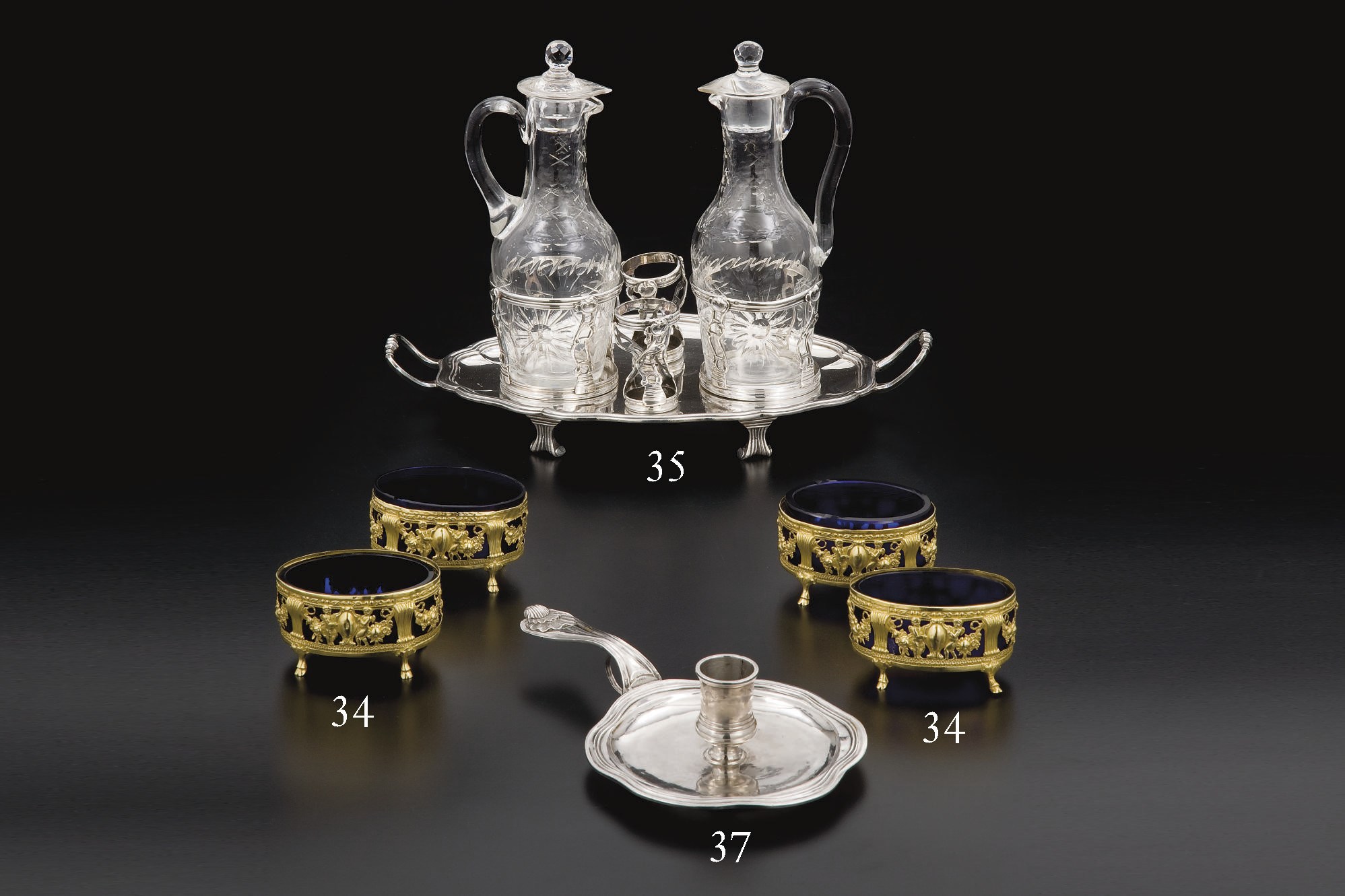 QUATRE SALERONS EN VERMEIL ET VERRE BLEU