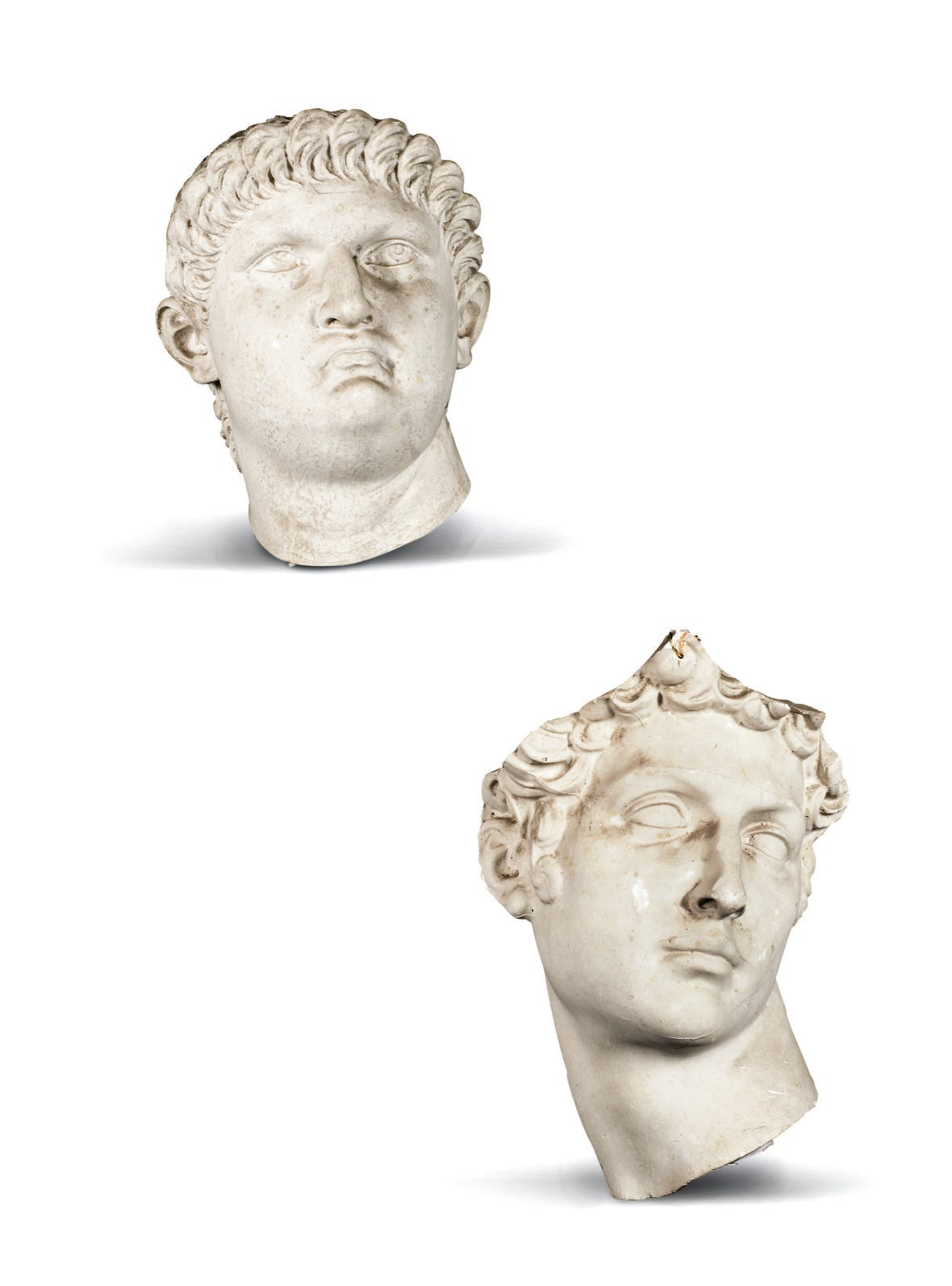 DEUX MOULAGES DE TETES D'HOMME EN PLATRE