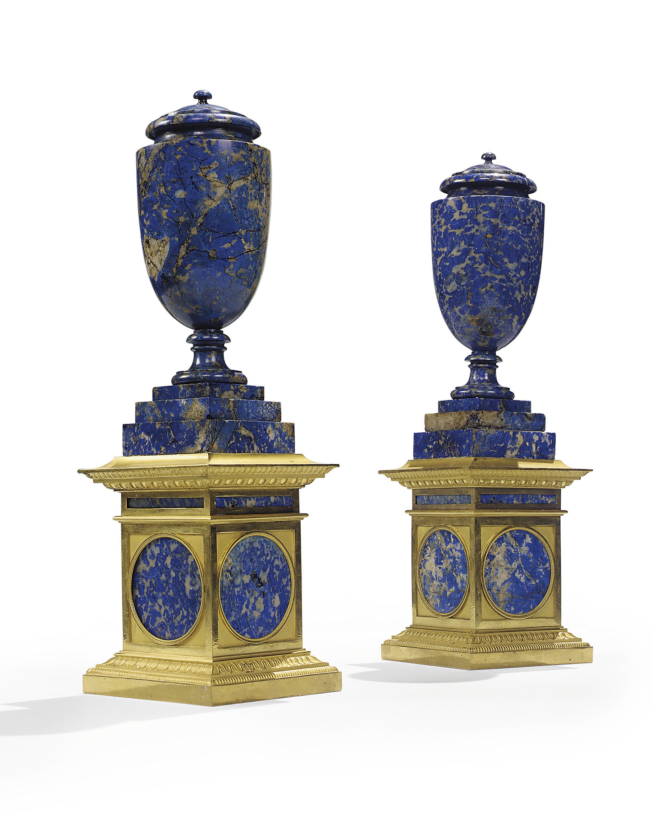 A NEAR PAIR OF LATE LOUIS XVI ORMOLU AND LAPIS LAZULI LIDDED VASES WITH COVERS