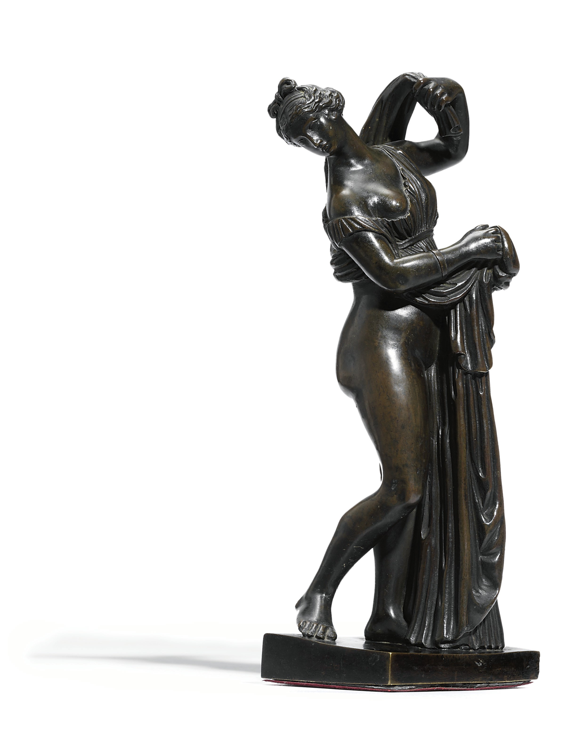 A BRONZE FIGURE OF THE CALLIPYGIAN VENUS
