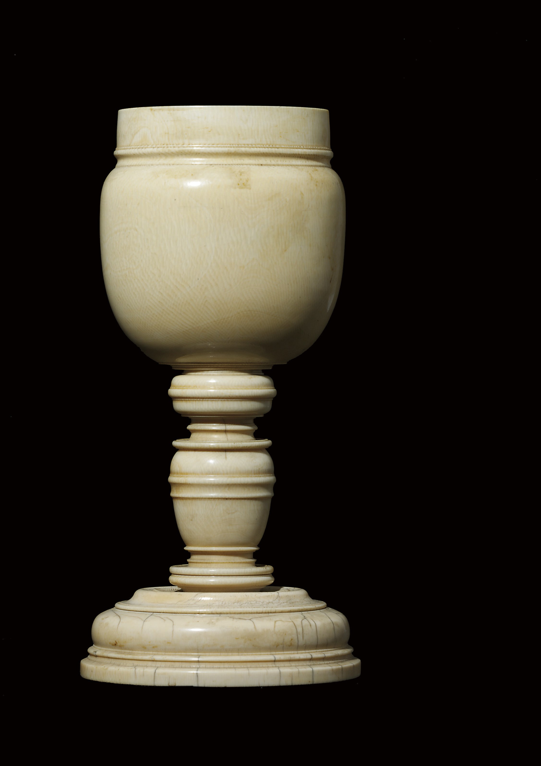 A TURNED IVORY CUP